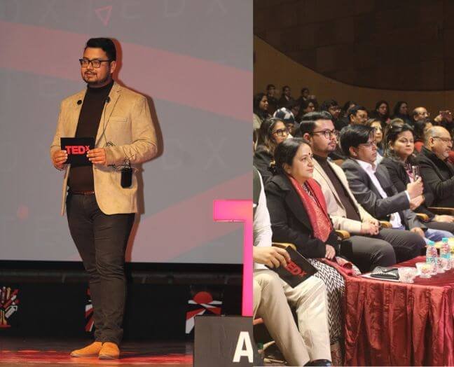 Vishal Saklani speaking on a TEDx stage with the event audience shown alongside